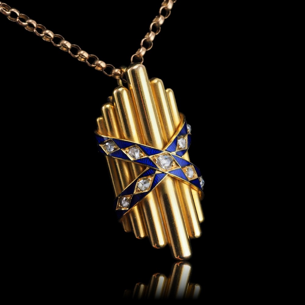 A Victorian 18K yellow gold pendant featuring vertical fluted bars encased by blue enamel cross-bands set with rose-cut diamonds. View XVII