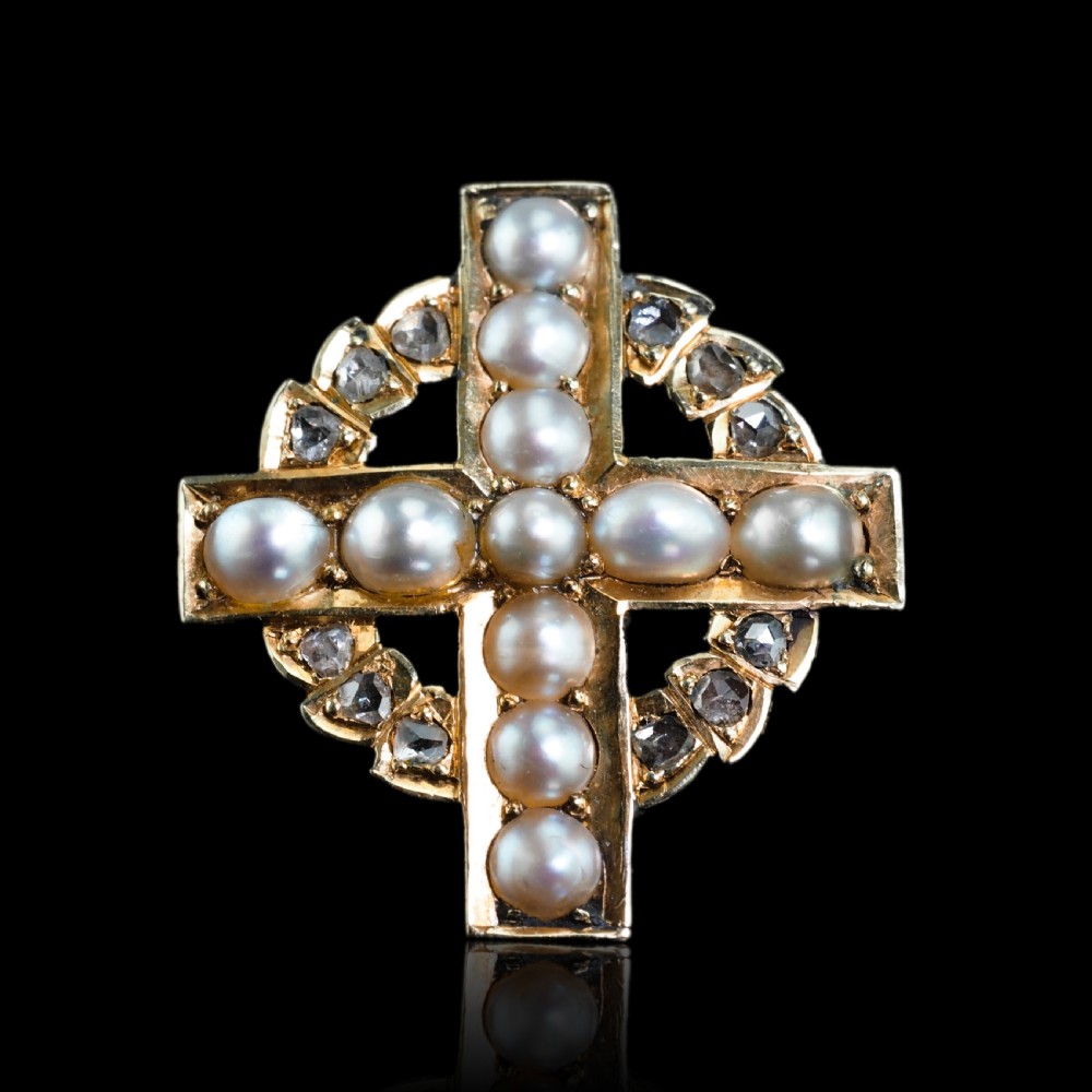 An antique 15K yellow gold Celtic cross brooch and pendant set with central pearls along the arms and diamonds set within the circular halo. View IX