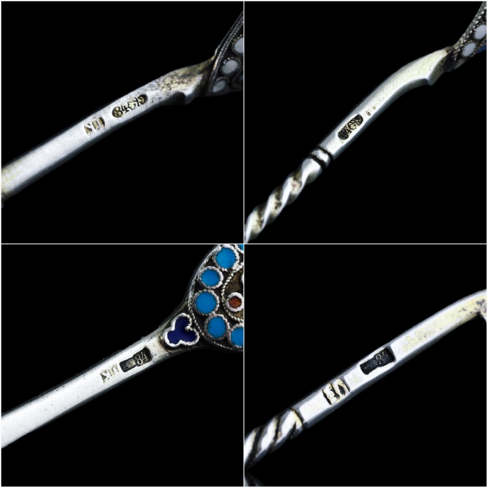 A four-piece set of late 19th-century Russian silver and cloisonne enamel cutlery featuring three spoons and a fork with turquoise blue, white, and red floral motifs. View XV