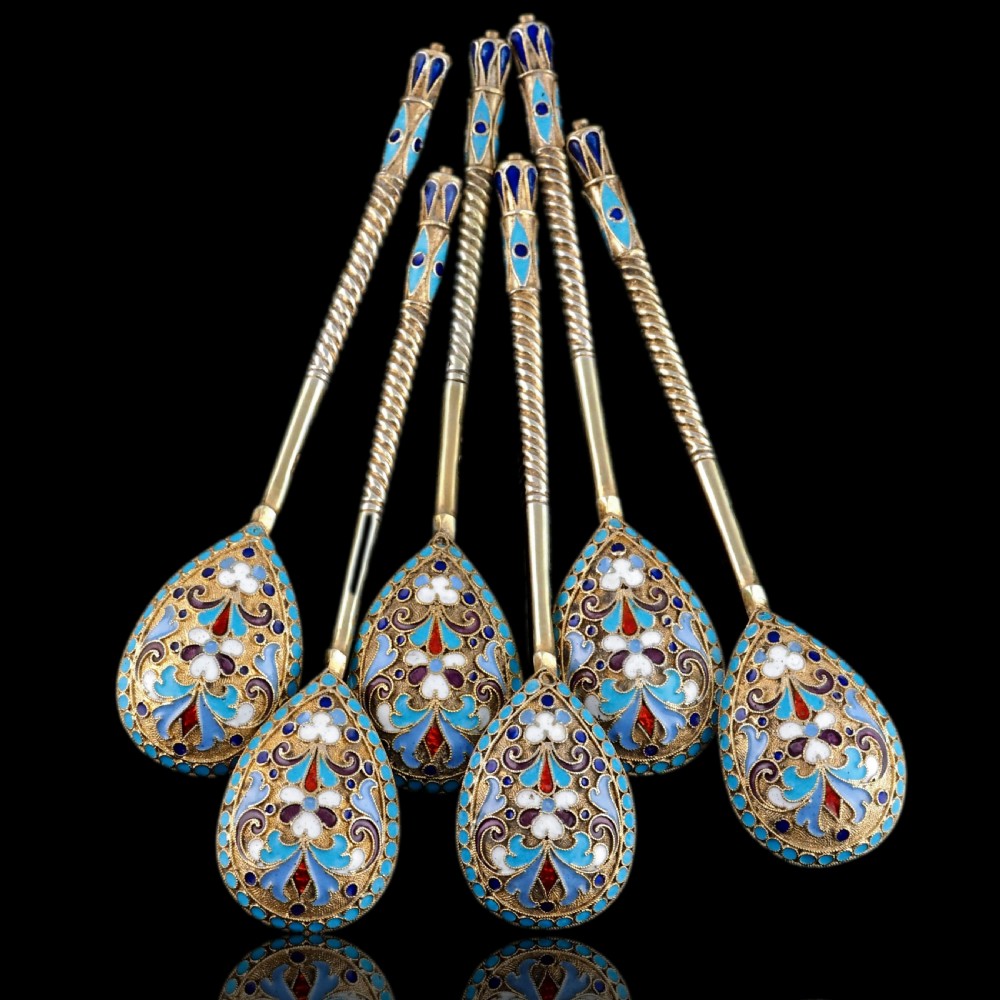 Set of six antique Russian silver gilt spoons featuring blue, red, and white cloisonne enamel scrollwork on the backs of the teardrop-shaped bowls. View II