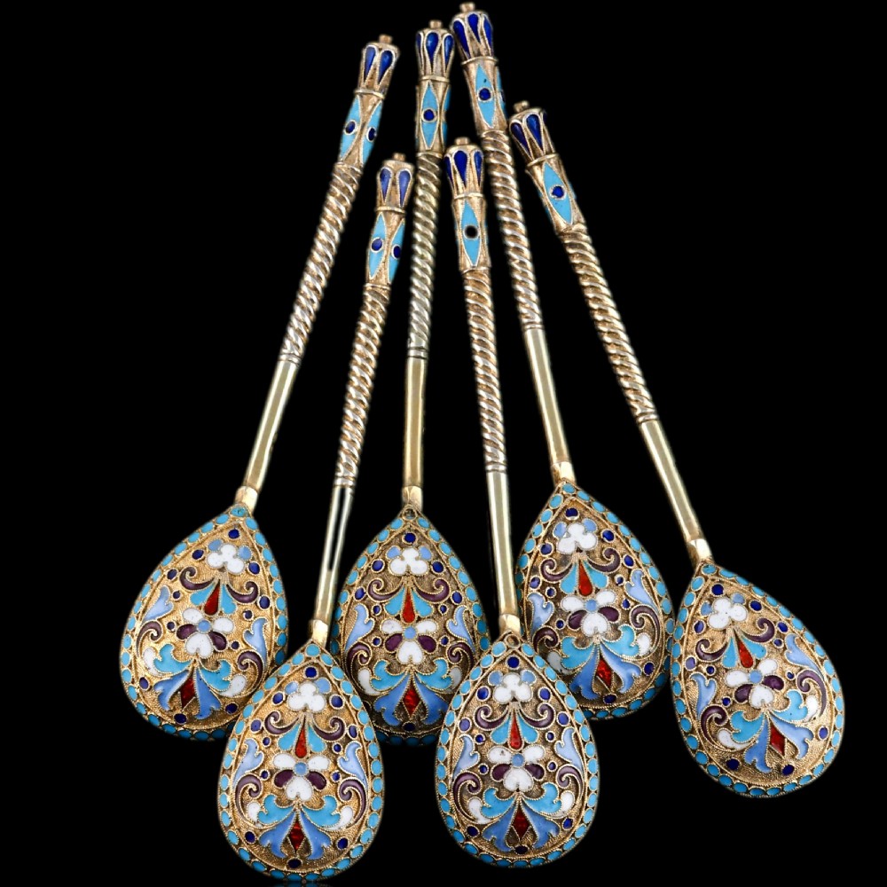 Set of six antique Russian silver gilt spoons featuring blue, red, and white cloisonne enamel scrollwork on the backs of the teardrop-shaped bowls. View III