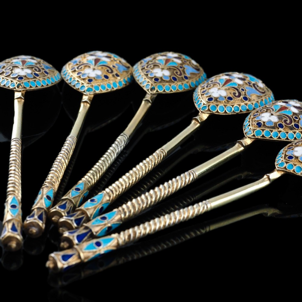Set of six antique Russian silver gilt spoons featuring blue, red, and white cloisonne enamel scrollwork on the backs of the teardrop-shaped bowls. View XVIII