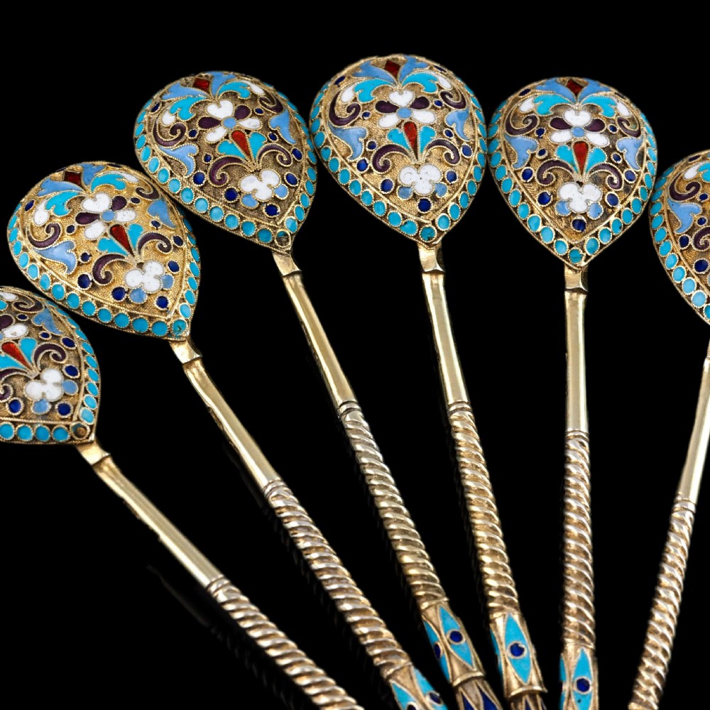 Set of six antique Russian silver gilt spoons featuring blue, red, and white cloisonne enamel scrollwork on the backs of the teardrop-shaped bowls. View XX