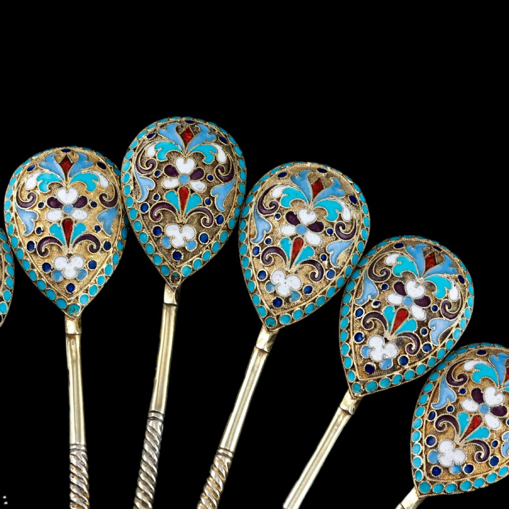 Set of six antique Russian silver gilt spoons featuring blue, red, and white cloisonne enamel scrollwork on the backs of the teardrop-shaped bowls. View XXI