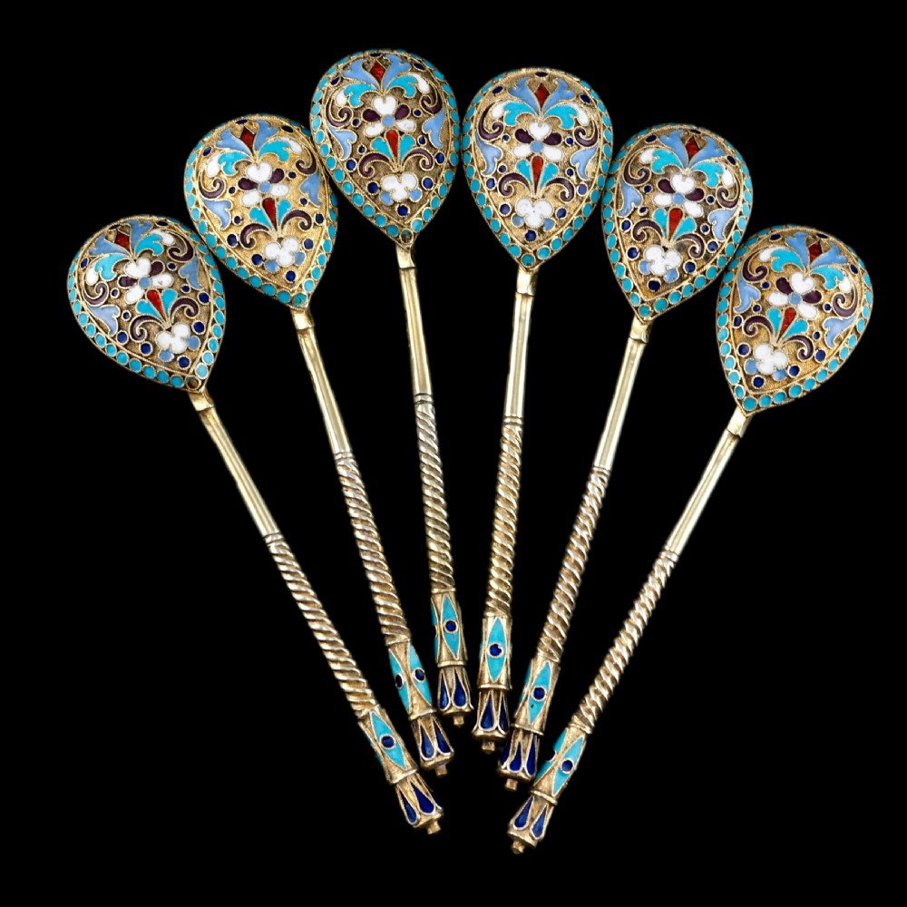 Set of six antique Russian silver gilt spoons featuring blue, red, and white cloisonne enamel scrollwork on the backs of the teardrop-shaped bowls. View XXII