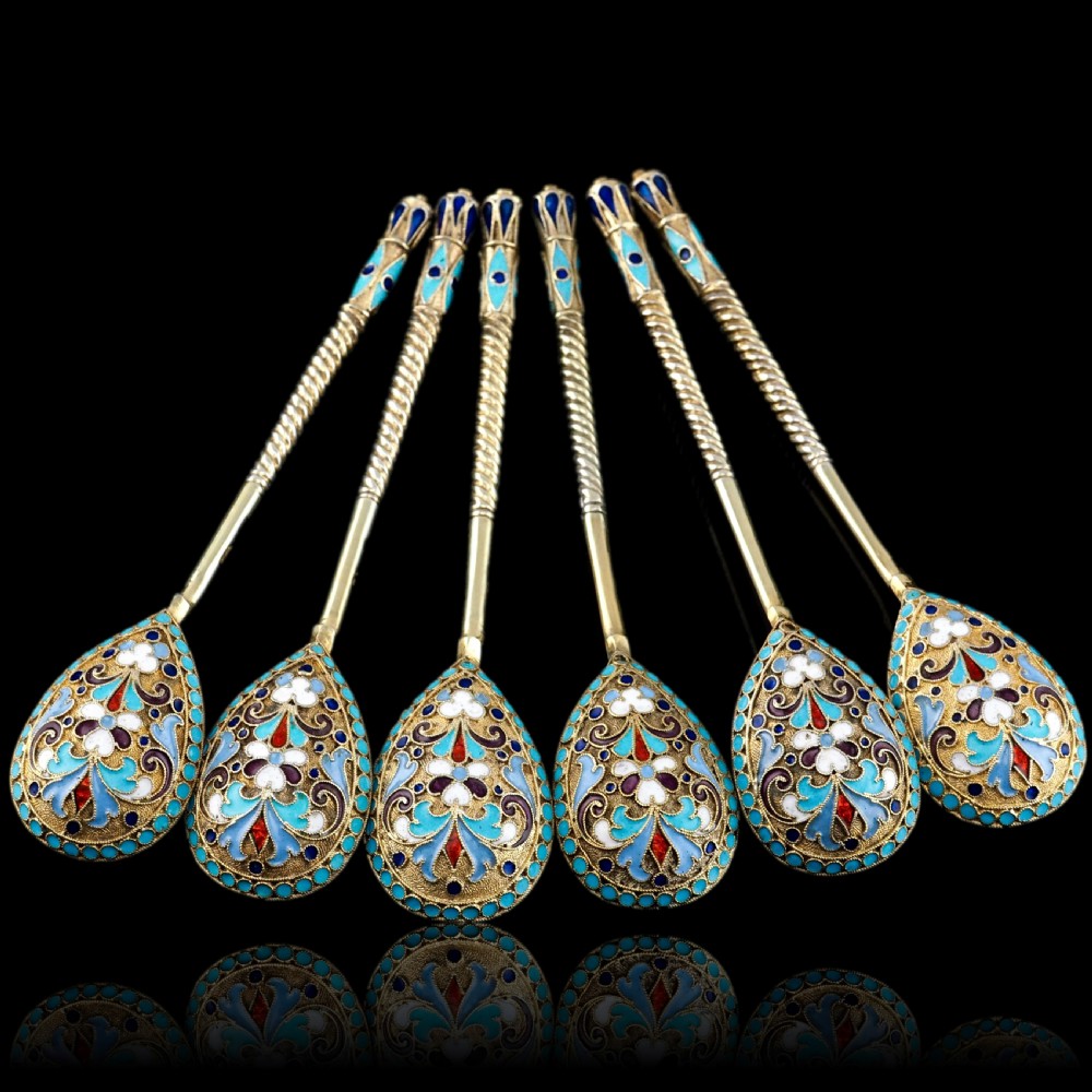Set of six antique Russian silver gilt spoons featuring blue, red, and white cloisonne enamel scrollwork on the backs of the teardrop-shaped bowls. View XXIV