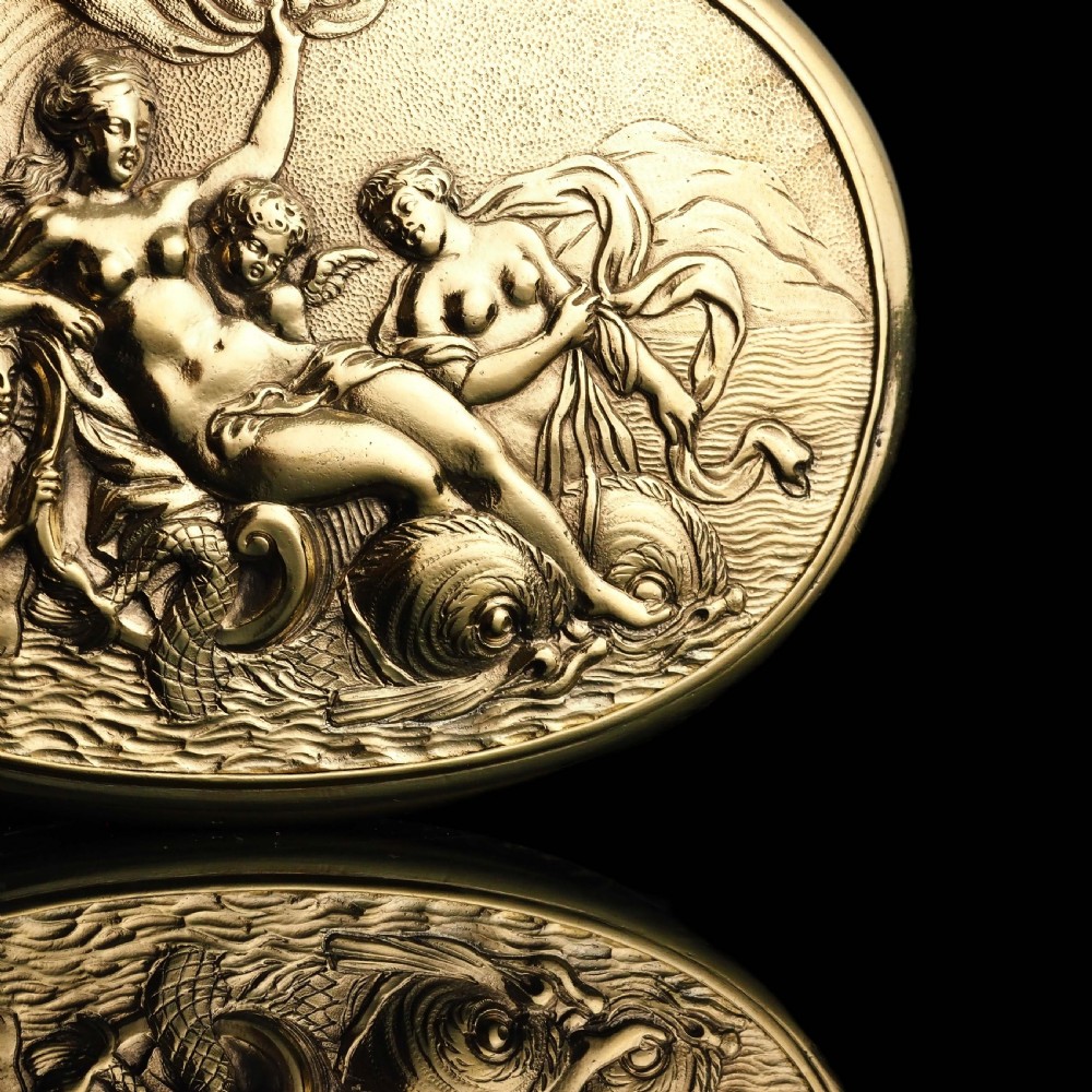An oval Georgian silver-gilt snuff box featuring a relief scene of Venus surrounded by attendants and sea creatures on the lid. View IV
