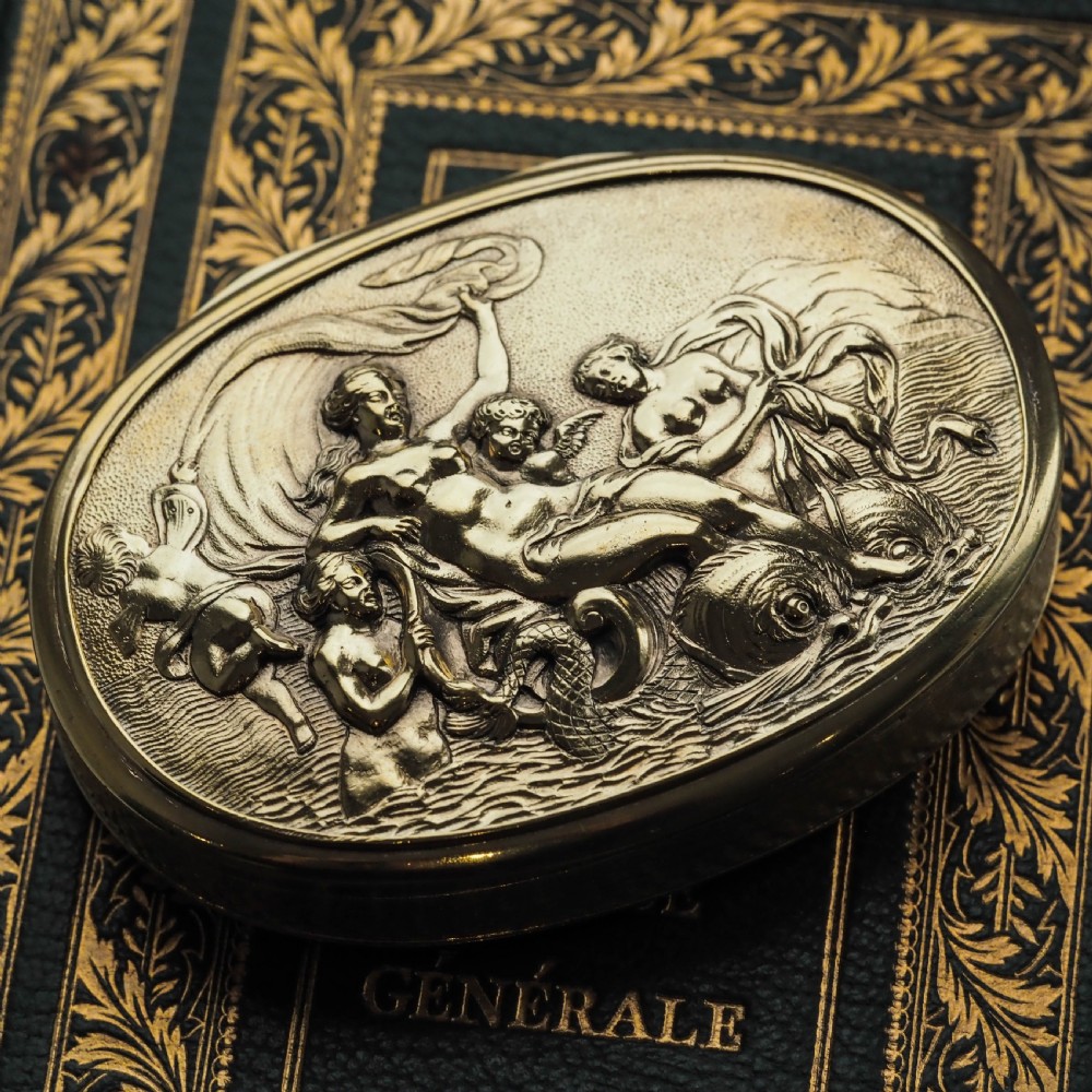 An oval Georgian silver-gilt snuff box featuring a relief scene of Venus surrounded by attendants and sea creatures on the lid. View XI
