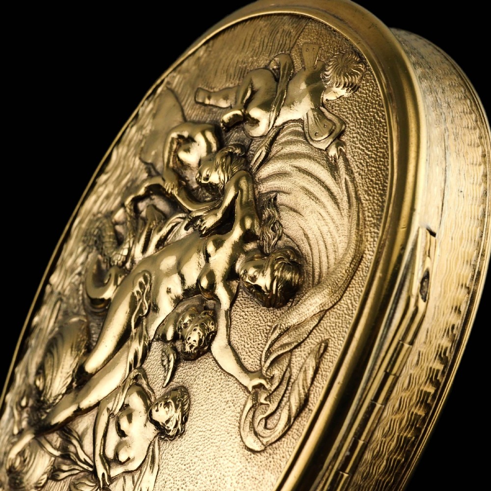 An oval Georgian silver-gilt snuff box featuring a relief scene of Venus surrounded by attendants and sea creatures on the lid. View XIV