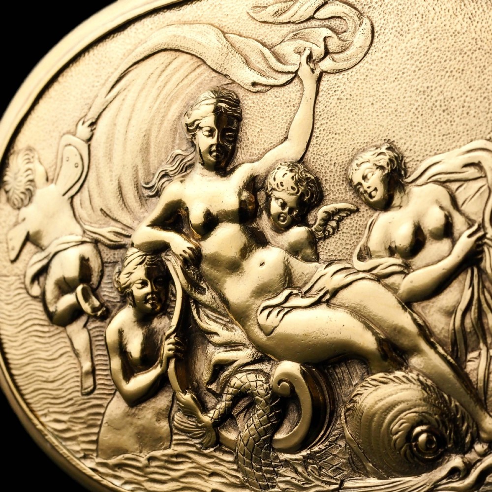 An oval Georgian silver-gilt snuff box featuring a detailed relief depicting Venus surrounded by attendants and cherubs on a textured ground. View XVIII