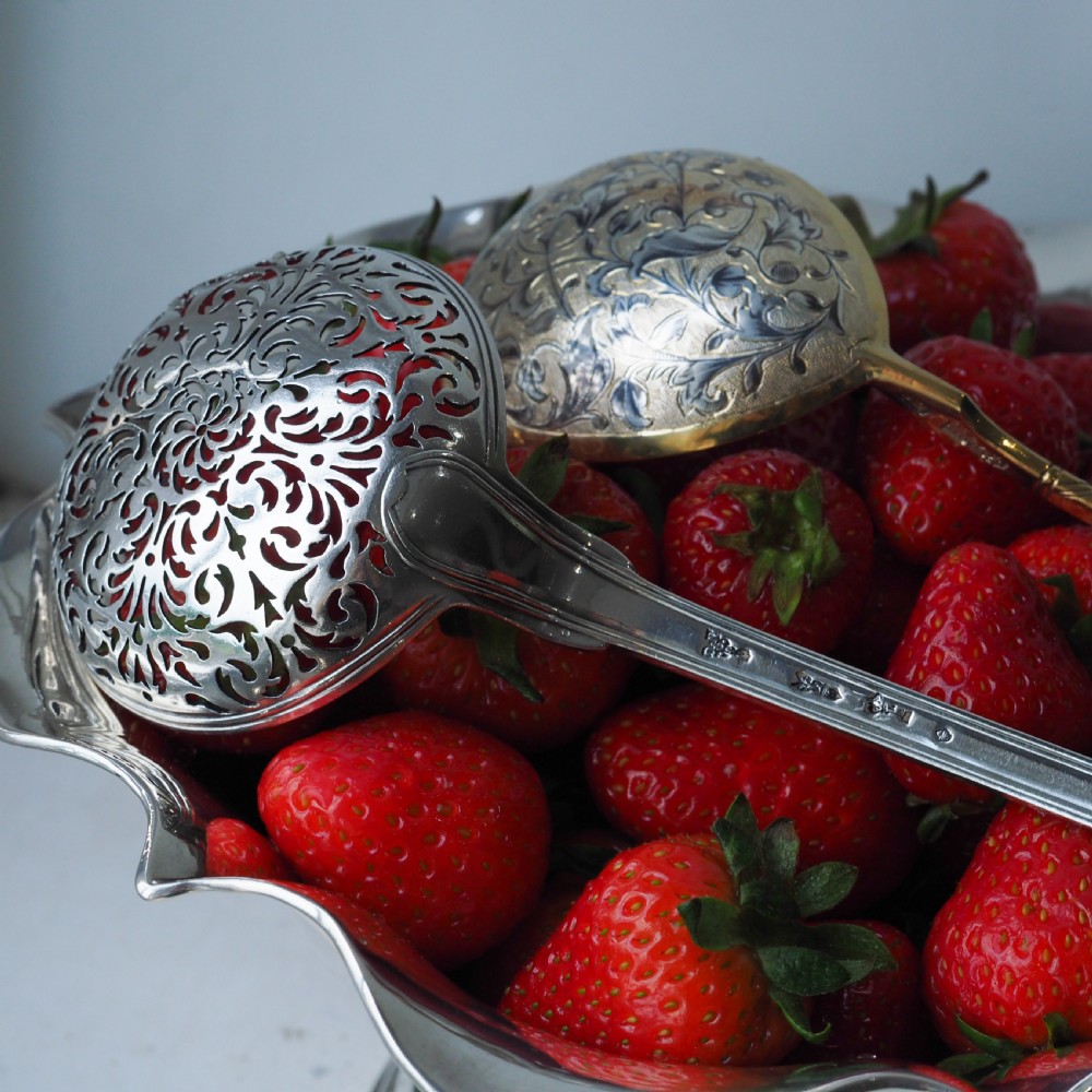 An antique Austro-Hungarian solid silver bowl featuring a flared, scalloped rim reminiscent of a floral blossom with a polished reflective finish. View XI