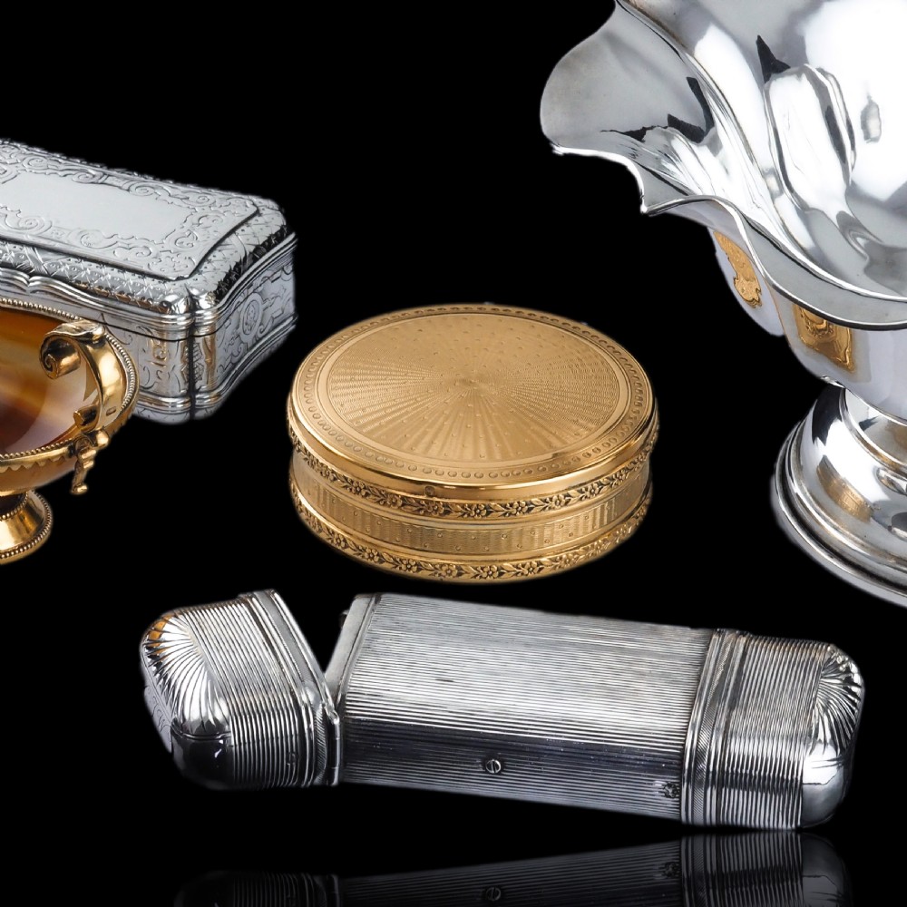 A 19th-century Dutch solid silver cigar case featuring a reeded linear texture and rounded ends with fan-shaped engraving. View VI