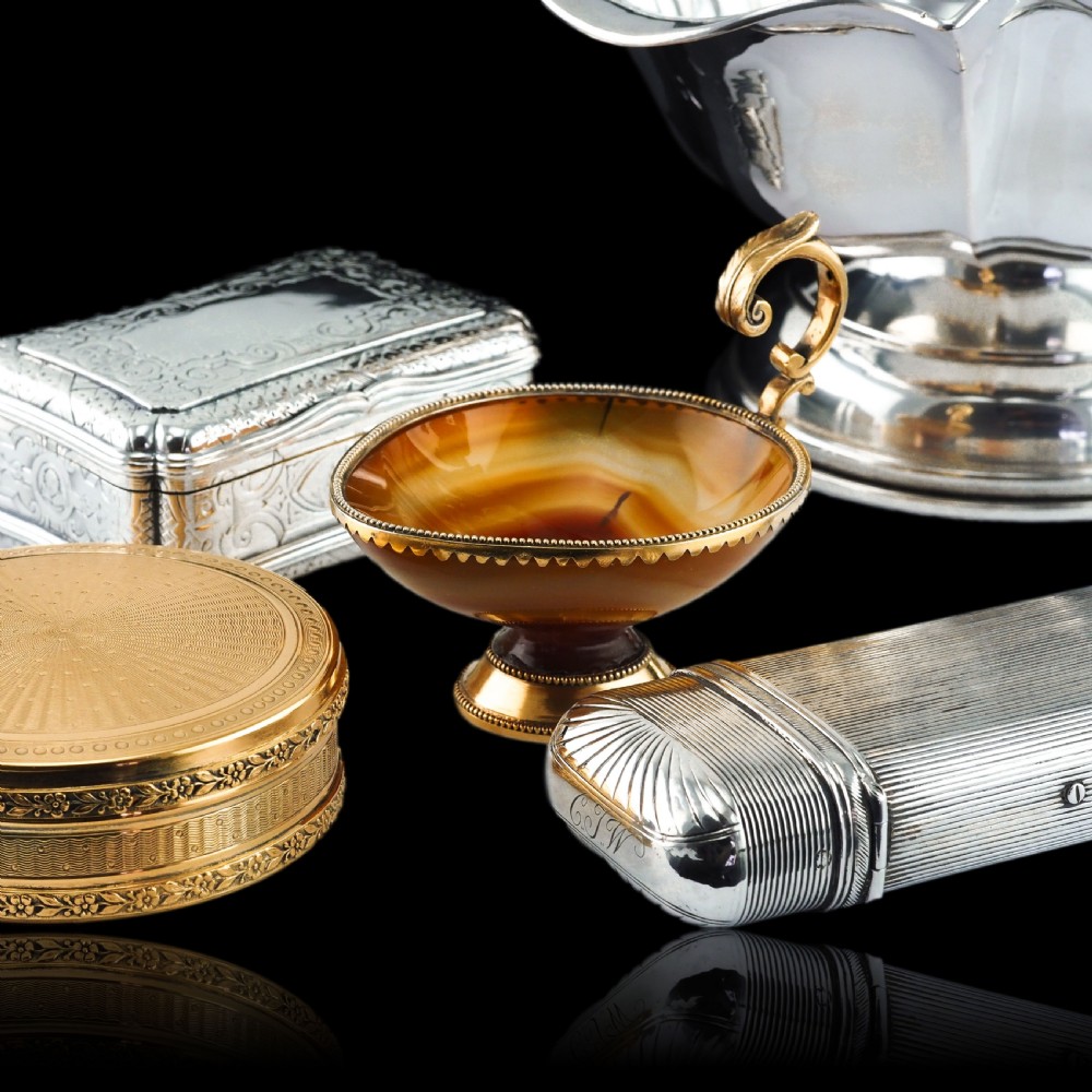A 19th-century Dutch solid silver cigar case featuring a reeded linear texture and rounded ends with fan-shaped engraving. View VII