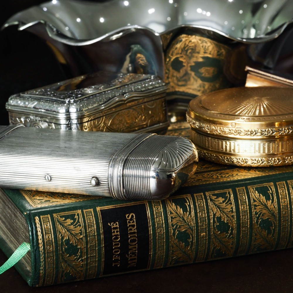 A 19th-century Dutch solid silver cigar case featuring a reeded linear texture and rounded ends with fan-shaped engraving. View VIII