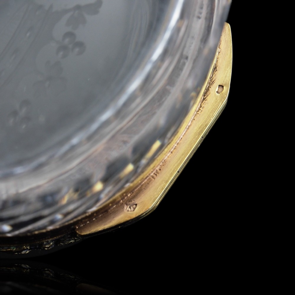 An oval cut crystal box featuring a gilt silver rim and a transparent glass lid etched with a nobility coronet crest. View XVIII