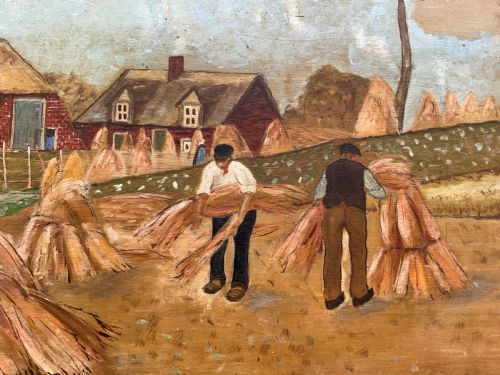 fig 8. A mid-20th-century naive oil painting depicting agricultural workers gathering hay bales in a field beside a timber windmill, thatched cottages, and trees, presented in a gilt frame.
