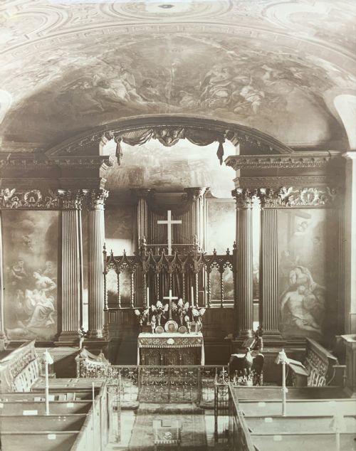 fig 1. A 1921 sepia photograph depicting a church altar and choir, mounted in a moulded dark oak frame with an engraved metal presentation plaque along the bottom edge.