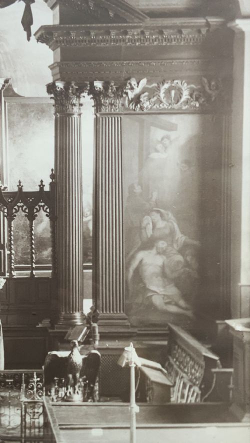 fig 6. A 1921 sepia photograph depicting a church altar and choir, mounted in a moulded dark oak frame with an engraved metal presentation plaque along the bottom edge.