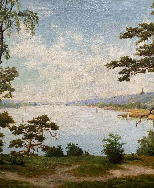 fig 3. A signed 20th-century oil painting depicting a calm lake with sailboats framed by birch and pine trees in a silvered wooden frame.
