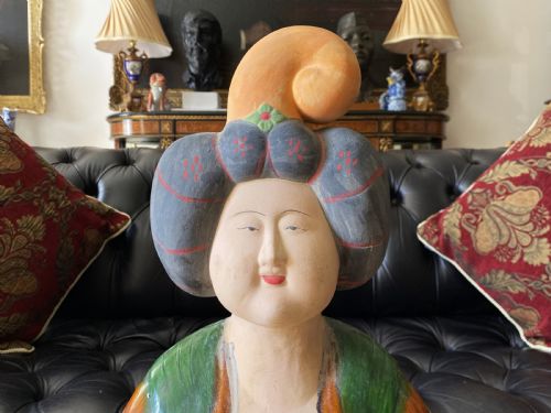 fig 6. A pair of large Sancai glazed ceramic sculptures depicting Tang Dynasty style female court musicians in orange, green, and cream robes.