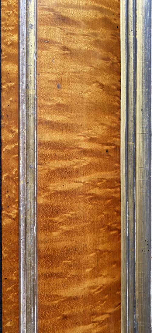 fig 6. An antique Biedermeier picture frame crafted from birds eye maple veneer with an inner gilt slip enclosing a needlework tapestry.