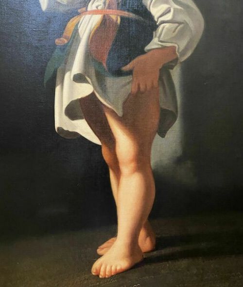 fig 4. An eighteenth-century Baroque style oil painting on canvas depicting a standing young child dressed in a white tunic and green vest, set within a carved gilt frame.