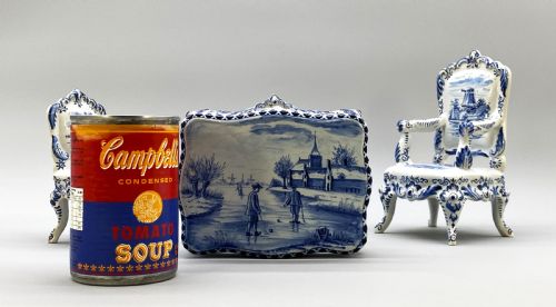 fig 5. A four-piece set of miniature ceramic furniture decorated with hand-painted blue and white Dutch landscapes and windmill scenes.