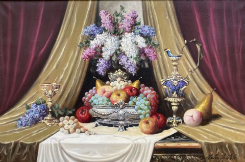 fig 1. A framed oil painting on canvas depicting a table with fruit, lilacs in a central vase, silver ewers, and draped gold and burgundy fabrics.