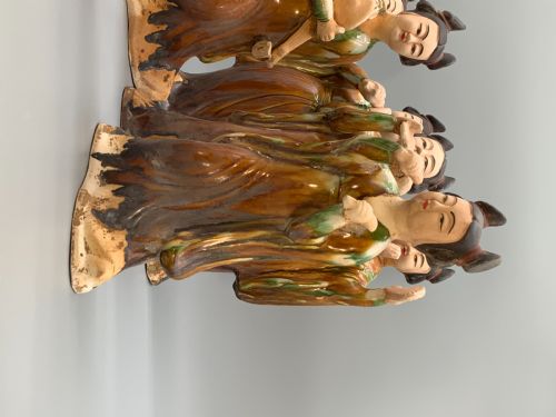 fig 4. A set of seven Tang dynasty style lead-glazed earthenware figurines depicting standing female court musicians holding traditional instruments.
