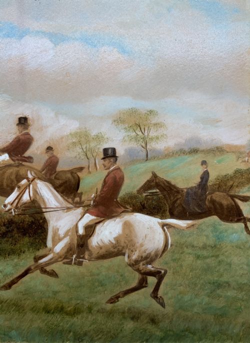 fig 3. An oil painting on board depicting horseback riders navigating a grassy field, housed in a decorative gilded frame.