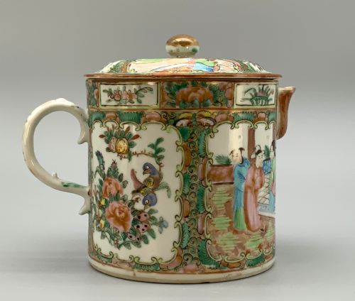 fig 5. A 19th-century Chinese export porcelain barrel-form coffee pot with cover, decorated with famille rose enamel figural reserves and floral patterns.