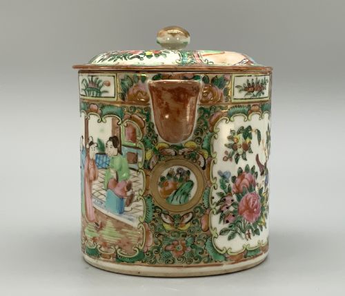 fig 6. A 19th-century Chinese export porcelain barrel-form coffee pot with cover, decorated with famille rose enamel figural reserves and floral patterns.