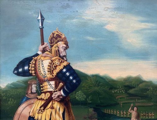 fig 3. An antique framed oil painting depicting Goliath clad in ornate gold and blue armour holding a spear, with David standing across a stream in the background.