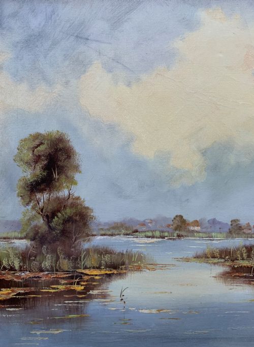 fig 3. A horizontal mid-century impressionist oil painting depicting a river scene with cottages along the bank under a cloud-filled sky, set within a light-coloured frame.