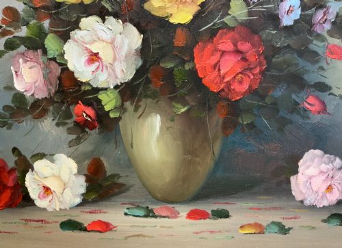 fig 5. A horizontal framed oil painting on canvas depicting a colourful bouquet of roses and garden flowers in a vase against a blue-grey background.