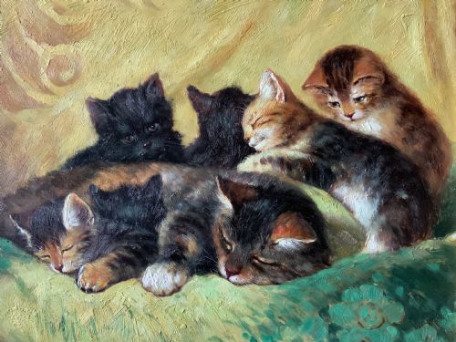 fig 4. An oil painting on a wooden panel depicting a mother cat and five kittens resting on a green fabric, housed in a wide gilt frame.