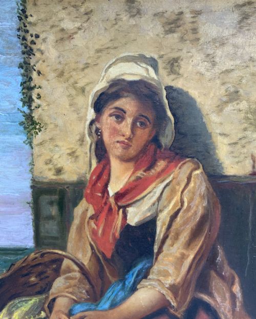 fig 6. A 19th-century oil painting depicting a young Dutch fisher girl in traditional costume seated near the sea, housed within an ornate gilt wooden frame.