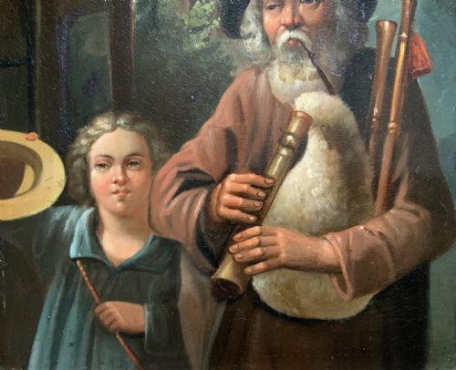 fig 3. An antique oil painting in a deep burr wood frame depicting an older bearded musician playing a bagpipe alongside a child holding an extended hat.