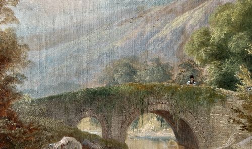 fig 6. A framed 19th-century oil painting depicting an arched stone bridge crossing a river amidst trees and distant mountains.