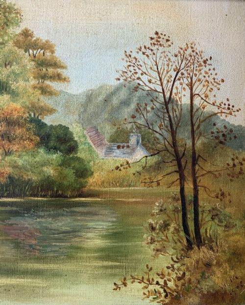 fig 4. An Edwardian oil painting depicting an angler fly fishing in a river surrounded by trees, enclosed in a moulded gold gilt frame.