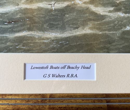 fig 3. A framed Victorian watercolour painting depicting sailing vessels on a choppy sea off Beachy Head, presented within a gold gilt frame and mount.