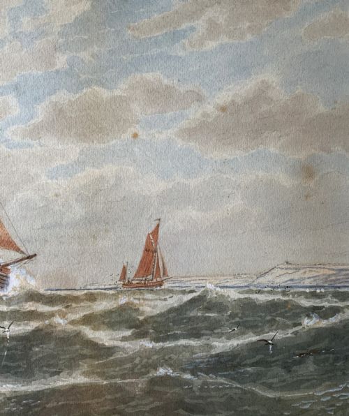 fig 5. A framed Victorian watercolour painting depicting sailing vessels on a choppy sea off Beachy Head, presented within a gold gilt frame and mount.