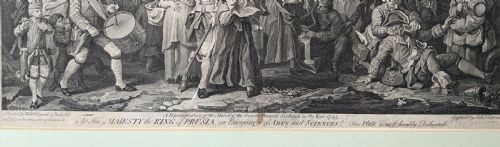 fig 5. An 18th-century black and white satirical engraving depicting a crowded street scene with soldiers, housed in a black and gold frame with a cream mount.