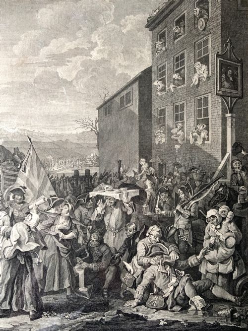 fig 6. An 18th-century black and white satirical engraving depicting a crowded street scene with soldiers, housed in a black and gold frame with a cream mount.
