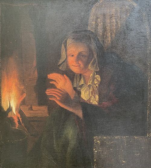 fig 2. A framed oil painting depicting a woman in historic dress warming her hands beside a glowing fire in a darkened interior.