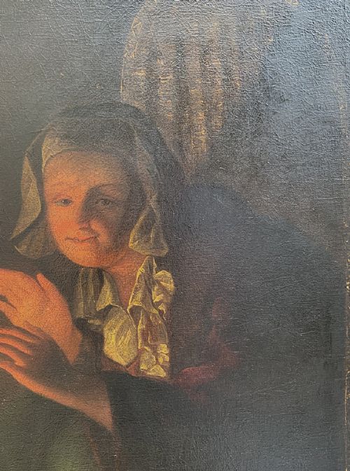fig 7. A framed oil painting depicting a woman in historic dress warming her hands beside a glowing fire in a darkened interior.