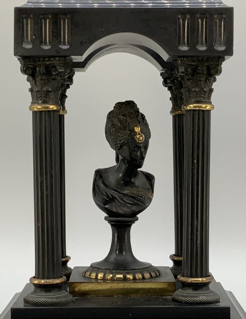 fig 3. A 19th-century patinated bronze and black marble classical domed temple featuring fluted columns and a central classical bust.