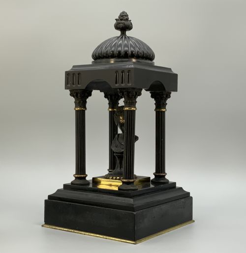 fig 4. A 19th-century patinated bronze and black marble classical domed temple featuring fluted columns and a central classical bust.