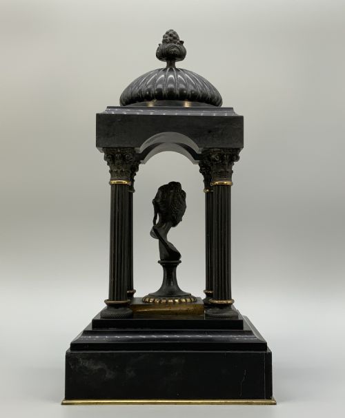 fig 7. A 19th-century patinated bronze and black marble classical domed temple featuring fluted columns and a central classical bust.