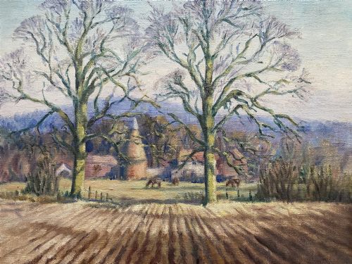 fig 3. An original landscape oil painting depicting a ploughed field and bare trees before a hop kiln, set in an ornate swept gilded frame.